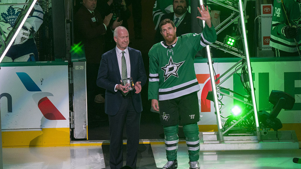 The Dallas Stars and general manager Jim Nill honor center Joe Pavelski (16) for scoring his 1,000 career NHL point in a ceremony before the game between the Dallas Stars and the Toronto Maple Leafs at the American Airlines Center.