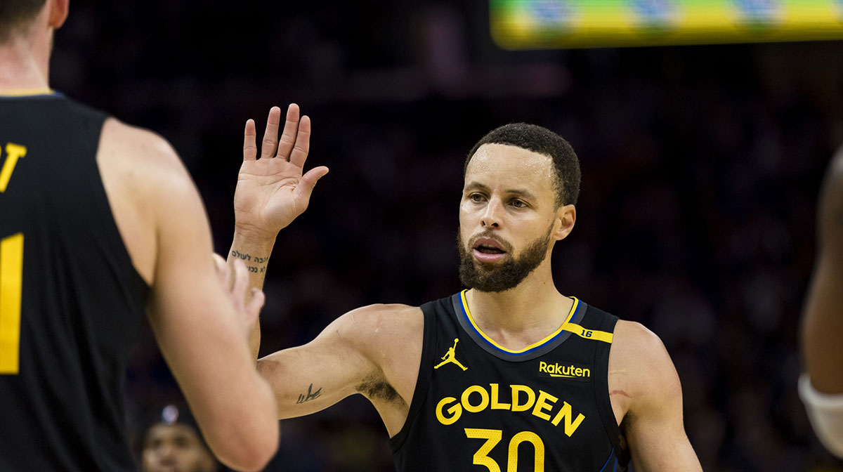 Golden State Warriors guard Stephen Curry (30) reacts during the third quarter against the Toronto Raptors at Chase Center.