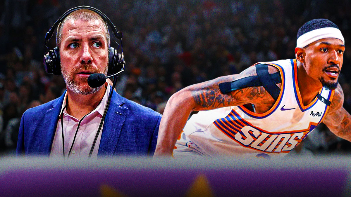 Tim MacMahon looking stern at Suns shooting guard Bradley Beal in a defensive stance.