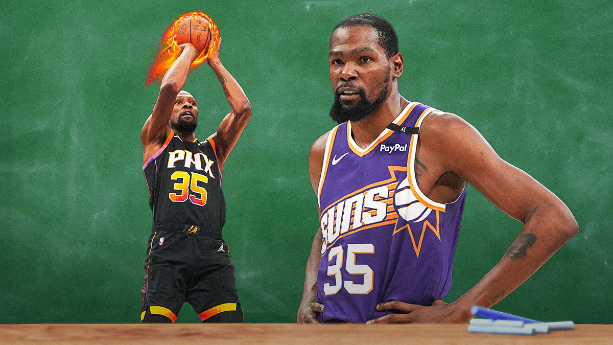 Kevin Durant in a Suns jersey next to a chalkboard in front of a class. On the chalkboard is a photo of him shooting a ball made of fire.