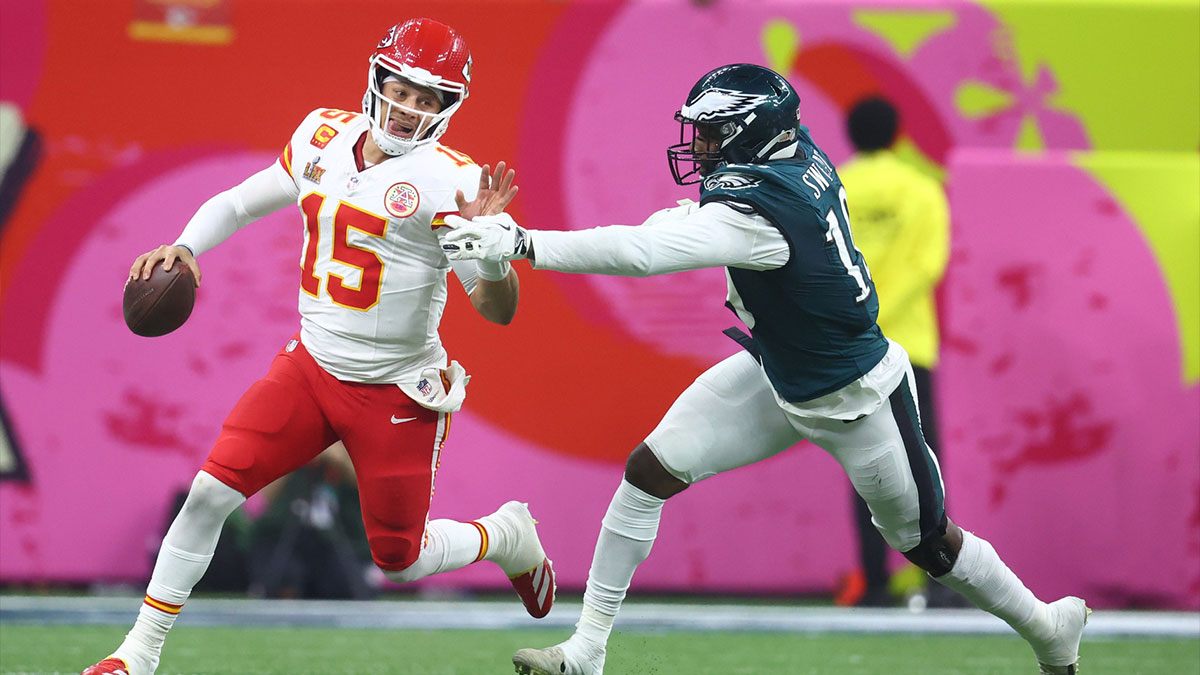 Kansas City Chiefs quarterback Patrick Mahomes (15) is tackled by Philadelphia Eagles linebacker Josh Sweat (19) in Super Bowl LIX between the Philadelphia Eagles and the Kansas City Chiefs at Ceasars Superdome.
