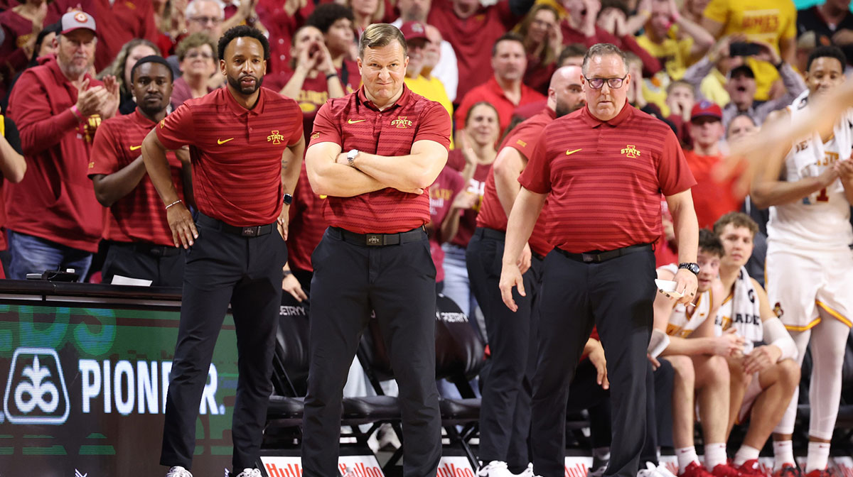 Iowa State Cyclones head coach T.J. Otzelberger, JR Blount and Kyle Green watch the Cyclones play the Brigham Young Cougars during the second half at James H. Hilton Coliseum.