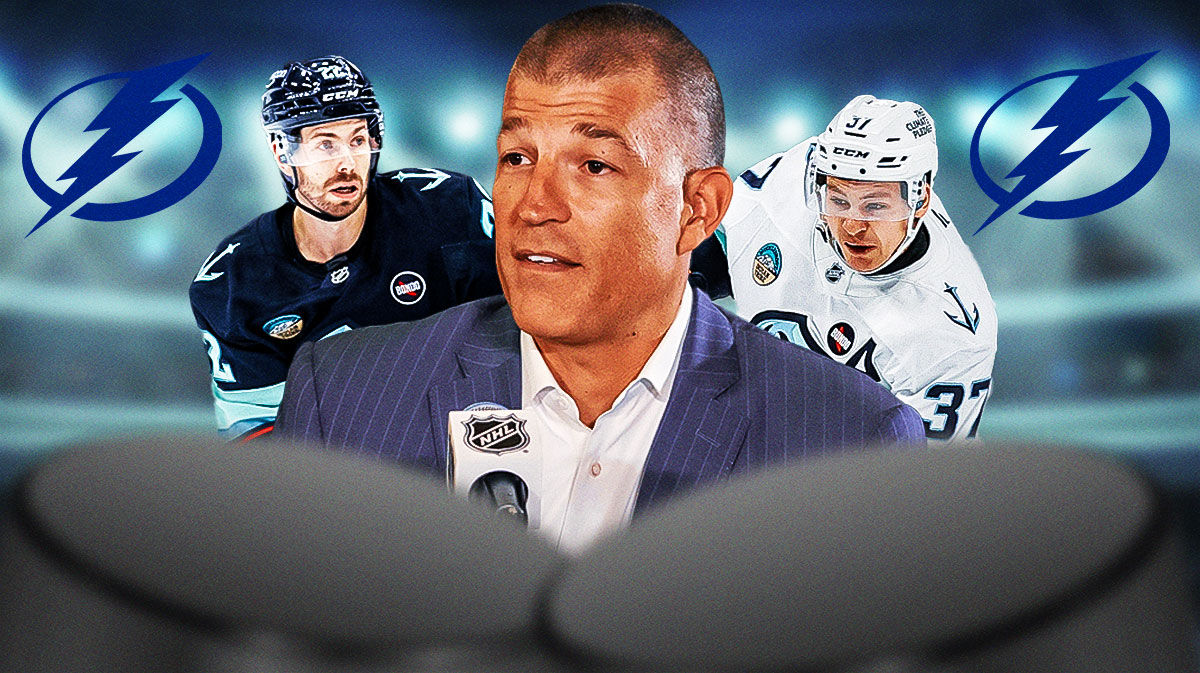 Julien BriseBois in middle, Yanni Gourde and Oliver Bjorkstrand on either side, Tampa Bay Lightning logo in background, hockey rink in background