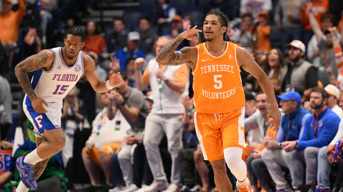 Tennessee Volunteers guard Zakai Zeigler (5) reacts after a three point basket against the Florida Gators in the first half during the 2025 SEC Championship Game at Bridgestone Arena.