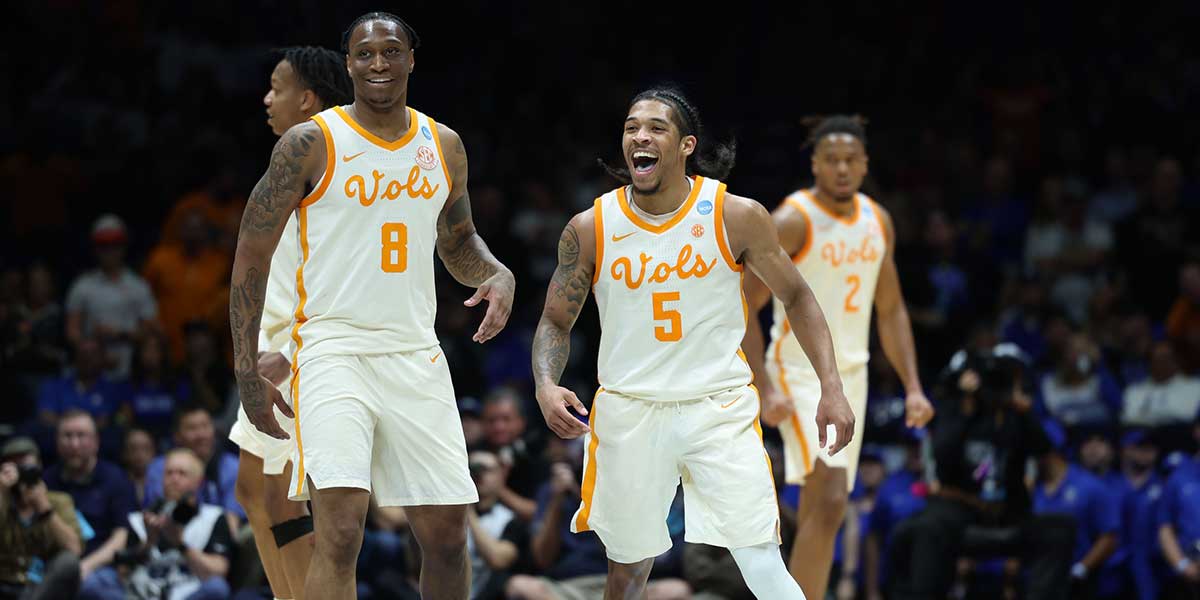 Tennessee Volunteers guard Zakai Zeigler (5) and guard Darlinstone Dubar (8) react against the Kentucky Wildcats in the second half during a Midwest Regional semifinal of the 2025 NCAA tournament at Lucas Oil Stadium.