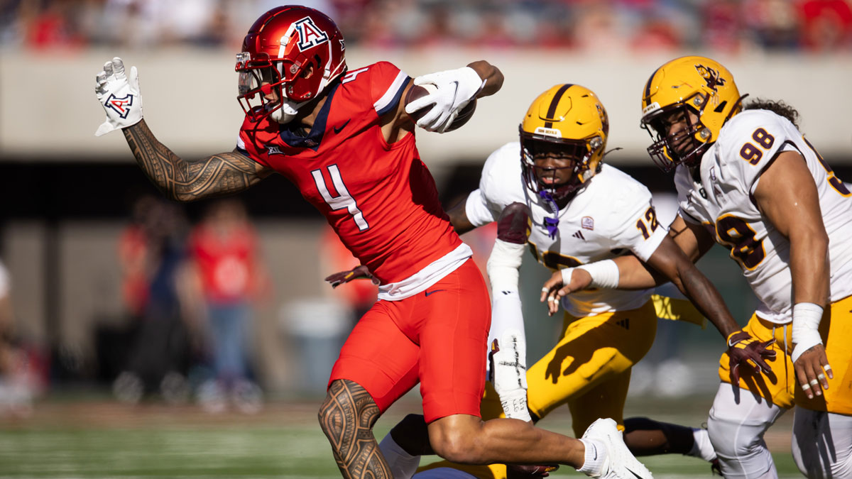 Arizona Wildcats wide receiver Tetairoa McMillan (4) against the Arizona State Sun Devils in the first half during the Territorial Cup at Arizona Stadium. Mandatory Credit: Mark J. Rebilas-Imagn Images