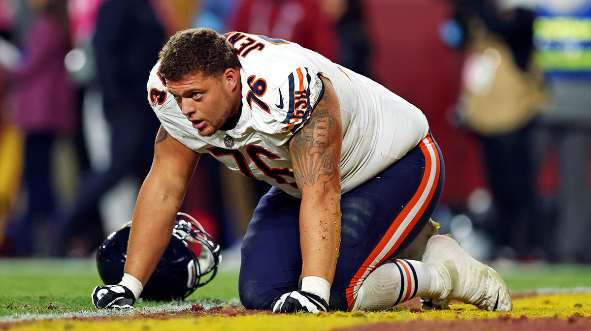 USA; Chicago Bears guard Teven Jenkins (76) reacts with an apparent injury during the fourth quarter against the Chicago Bears at Commanders Field.