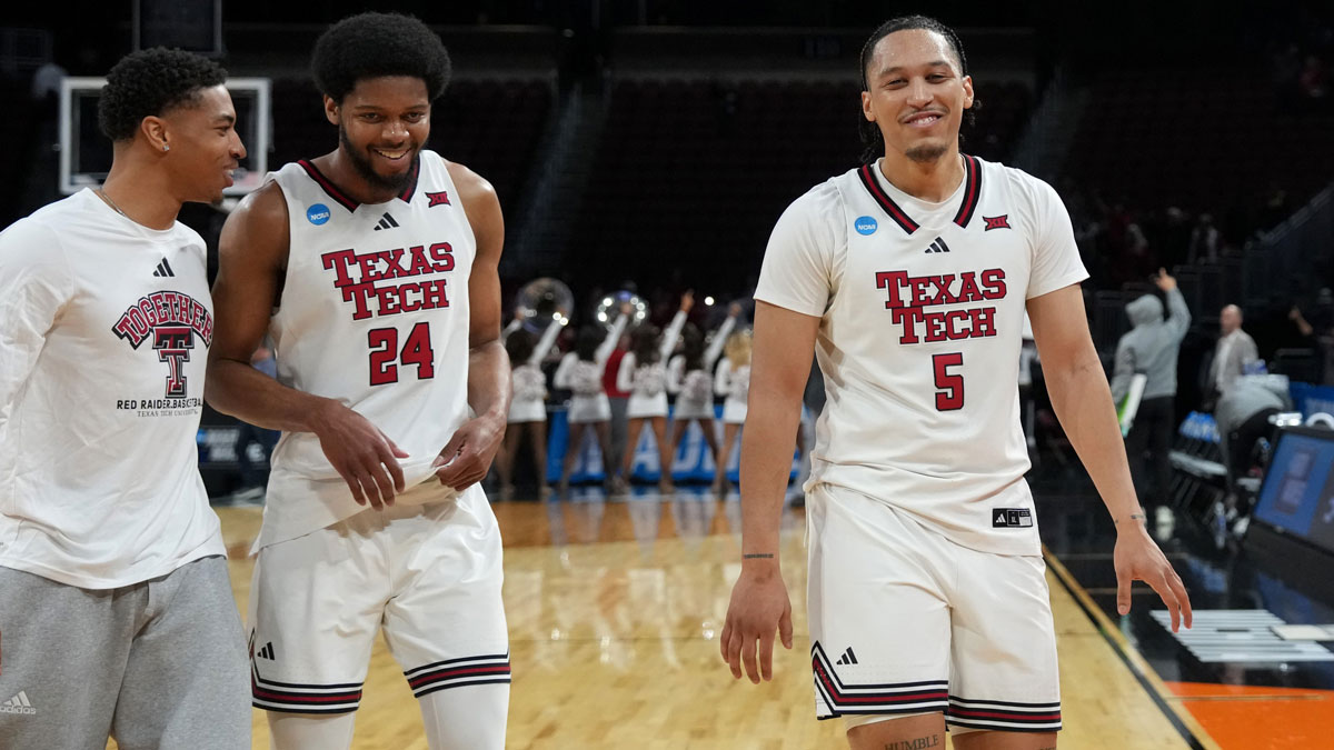 Texas Tech Red Raiders forward Darrion Williams (5) and guard Kerwin Walton (24) celebrate with teammates after defeating the North Carolina-Wilmington Seahawks in a first round men’s NCAA Tournament game at Intrust Bank Arena.