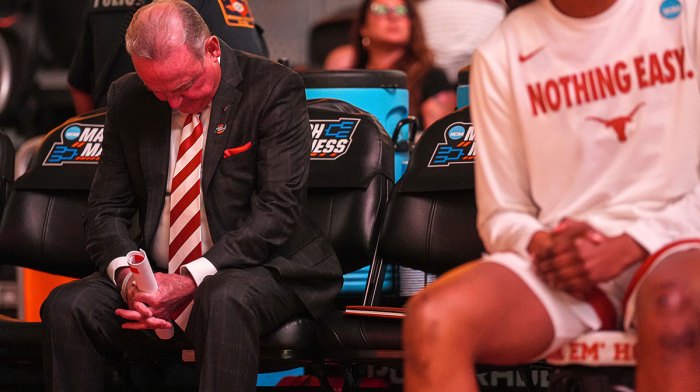 Texas Longhorns head coach Vic Schaefer bows his head ahead of the second round NCAA playoff game against Illinois.