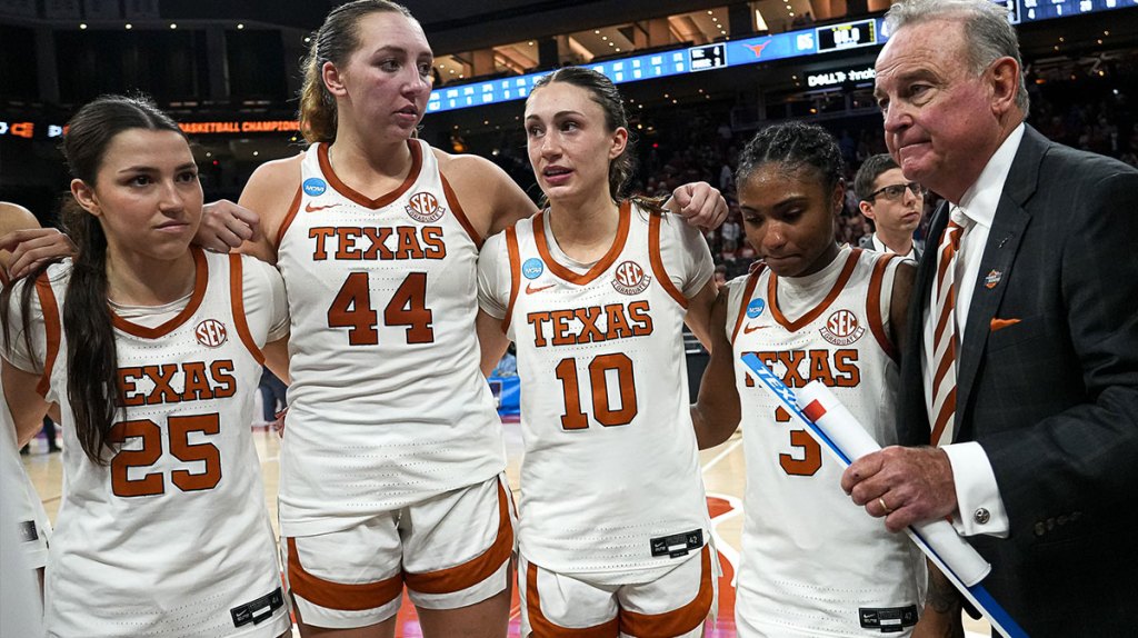 Texas Longhorns head coach Vic Schaefer talks to his team after the second round NCAA playoff game against Illinois.