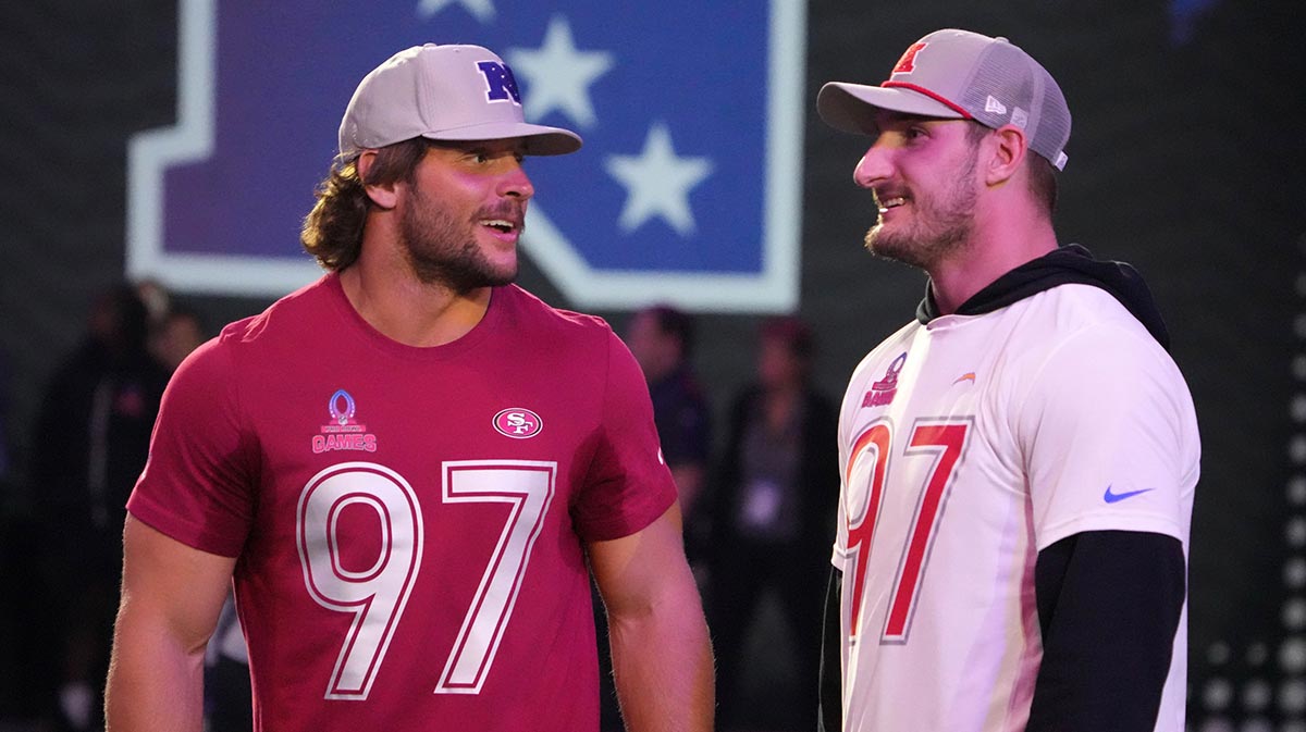 NFC defensive end Nick Bosa of the San Francisco 49ers (left) with brother and AFC linebacker Joey Bosa during the Pro Bowl Skills Challenge at Nicholson Fieldhouse