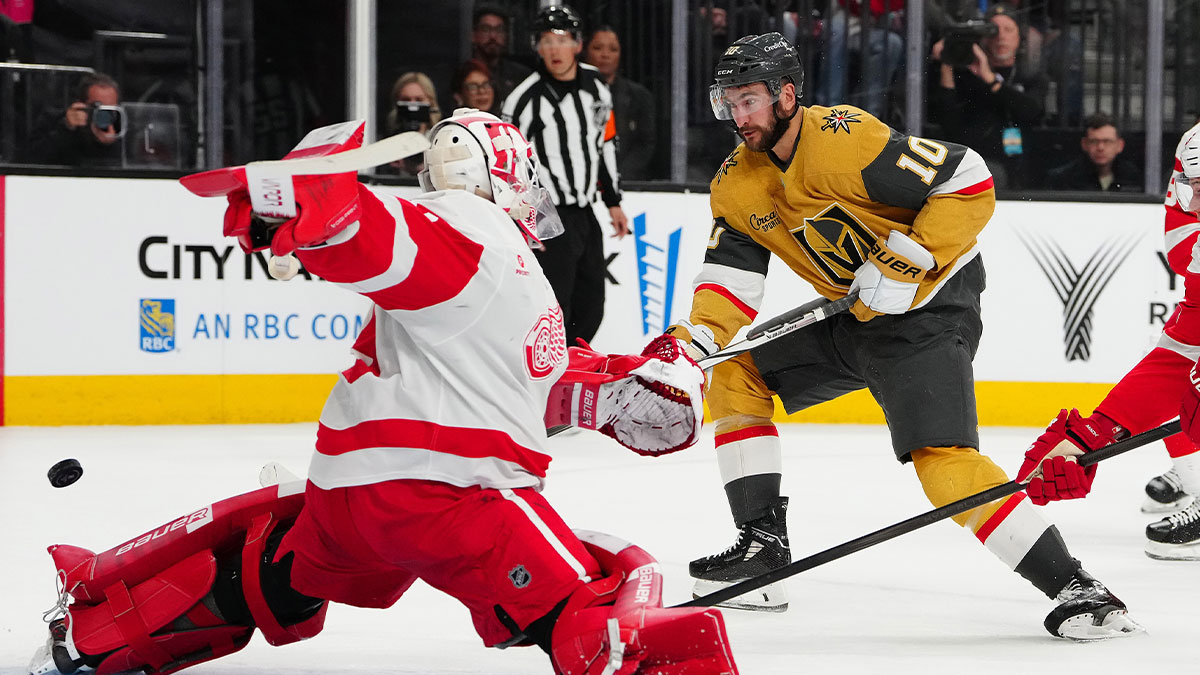 Vegas Golden Knights center Nicolas Roy (10) scores against Detroit Red Wings goaltender Cam Talbot (39) during the first period at T-Mobile Arena.