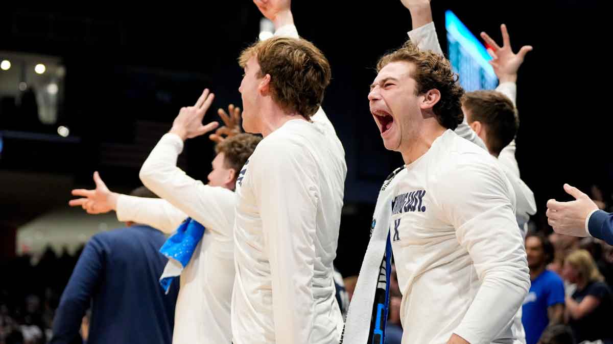 The Xavier Musketeers bench celebrates as they tie th game in the second half of the NCAA Tournament First Four game between the Xavier Musketeers and the Texas Longhorns at University of Dayton Arena in Dayton, Ohio, on Wednesday, March 19, 2025. Xavier advances with an 86-80 win over Texas, moving on to play Illinois in the first round.