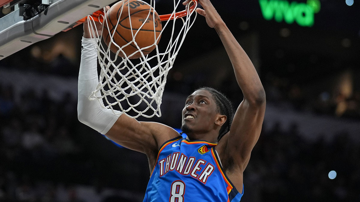 Thunder forward Jalen Williams (8) dunks in the second half against the San Antonio Spurs at Frost Bank Center