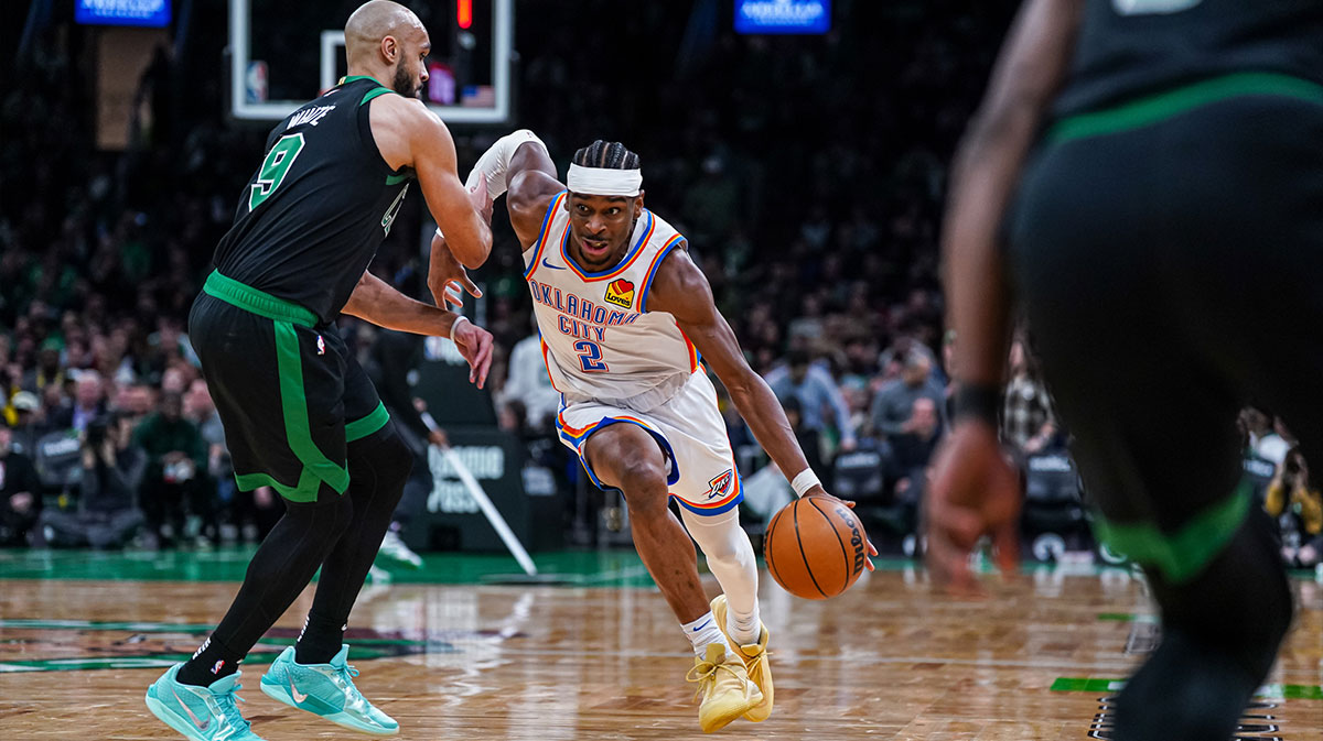 Thunder Guard Shai Gilgeous-Alexander (2) Powered by Boston Celtics Guard Derrick White (9) in the third quarter in the TD garden