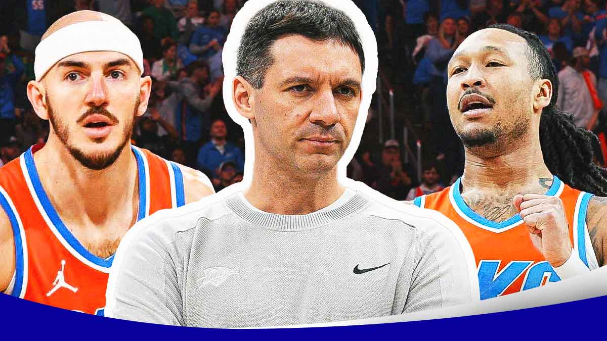 Thunder head coach Mark Daigneault in between Thunder guard Alex Caruso and Thunder center Jaylin Williams