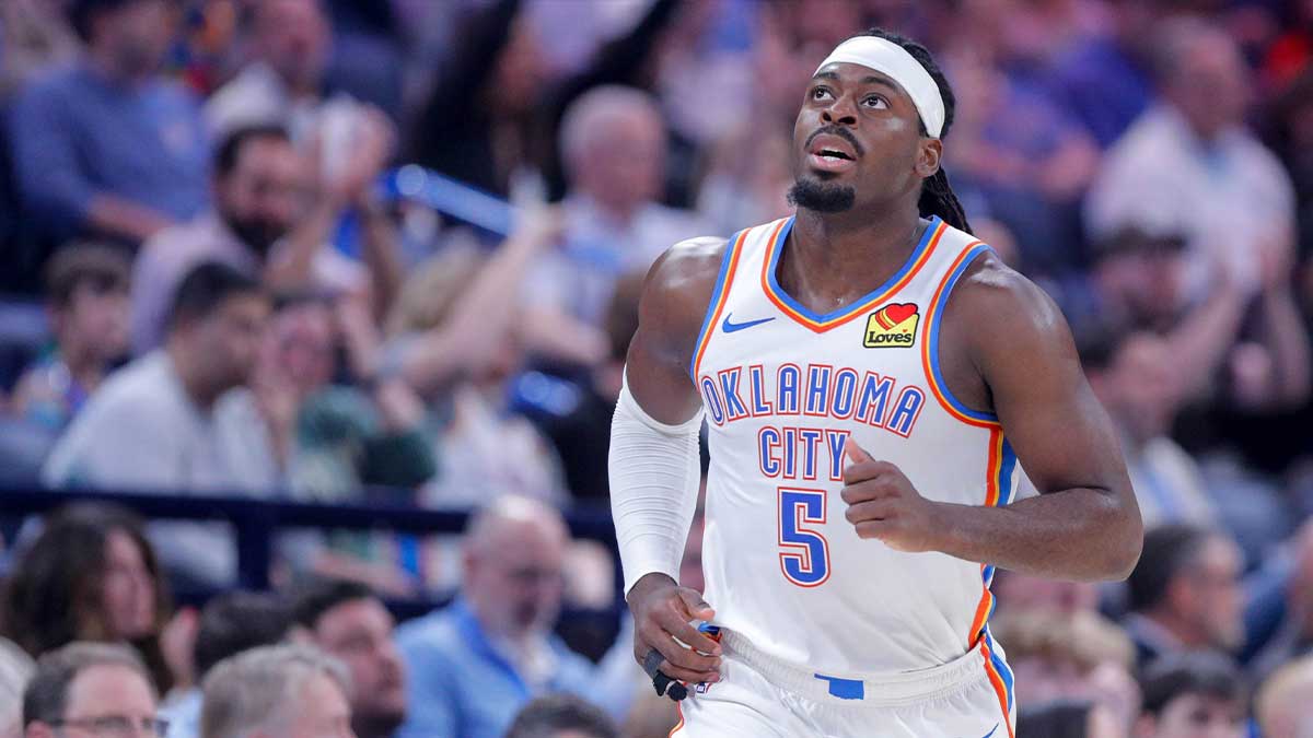 Grizzlies forward Jaren Jackson Jr. (13) moves the ball down the court beside Oklahoma City Thunder guard Luguentz Dort (5) during the second half at Paycom Center