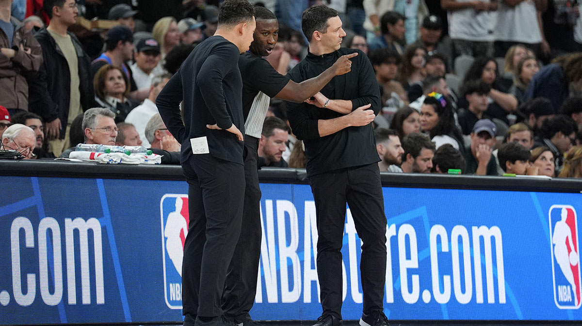 Spurs acting coach Mitch Johnson and Oklahoma City Thunder head coach Mark Daigneault after an altercation in the second half at Frost Bank Center