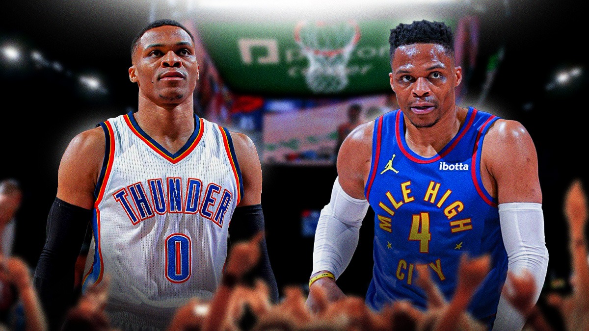 Former Thunder Russell Westbrook (in a Thunder uniform) next to Thunder fans inside the Paycom Center with Westbrook (in a Nuggets uniform) on the Paycom Center's big screen in the background