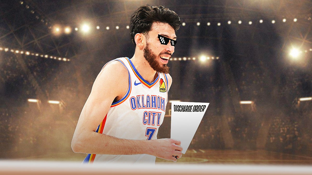 Thunder's Chet Holmgren smiling, with thug life shades on while holding a hospital discharge form