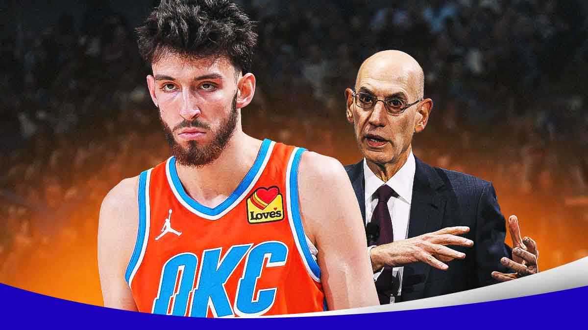 Chet Holmgren next to Adam Silver.
