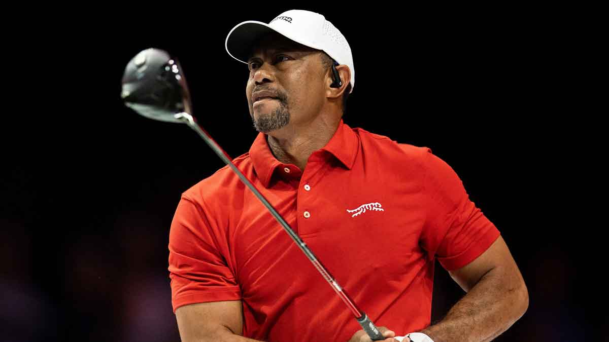 Tiger Woods of Jupiter Links GC tees off during their TGL match against Atlanta Drive GC at SoFi Center