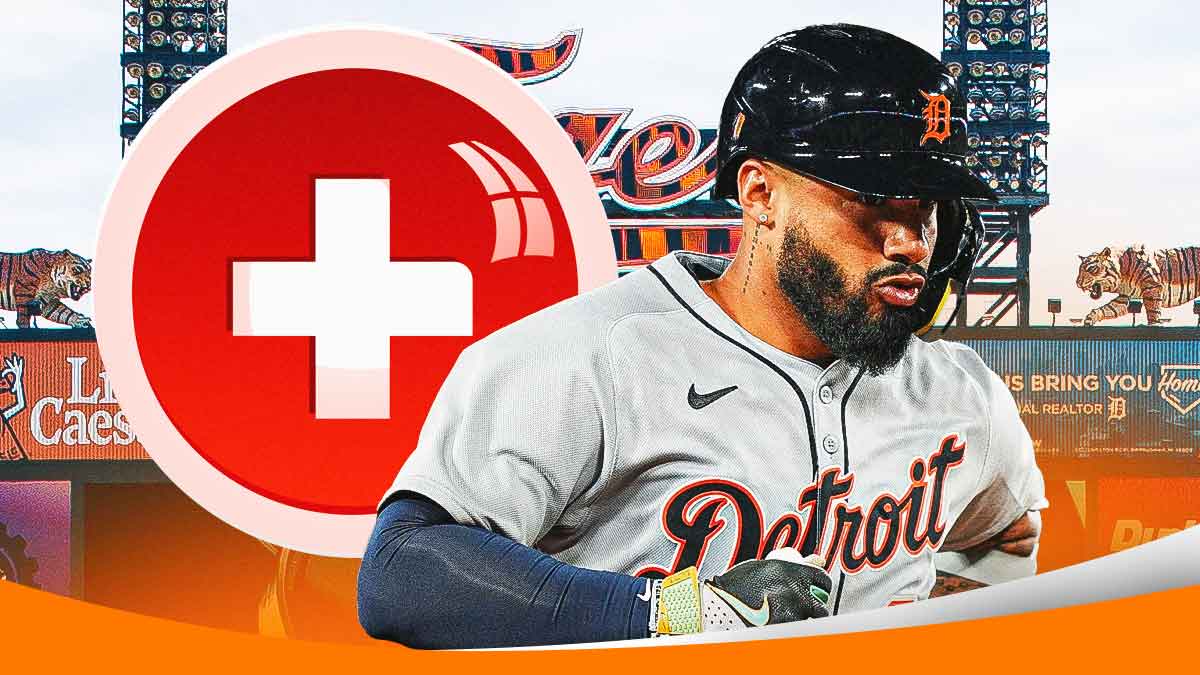 Gleyber Torres (Tigers) with med cross + and Comerica Park background