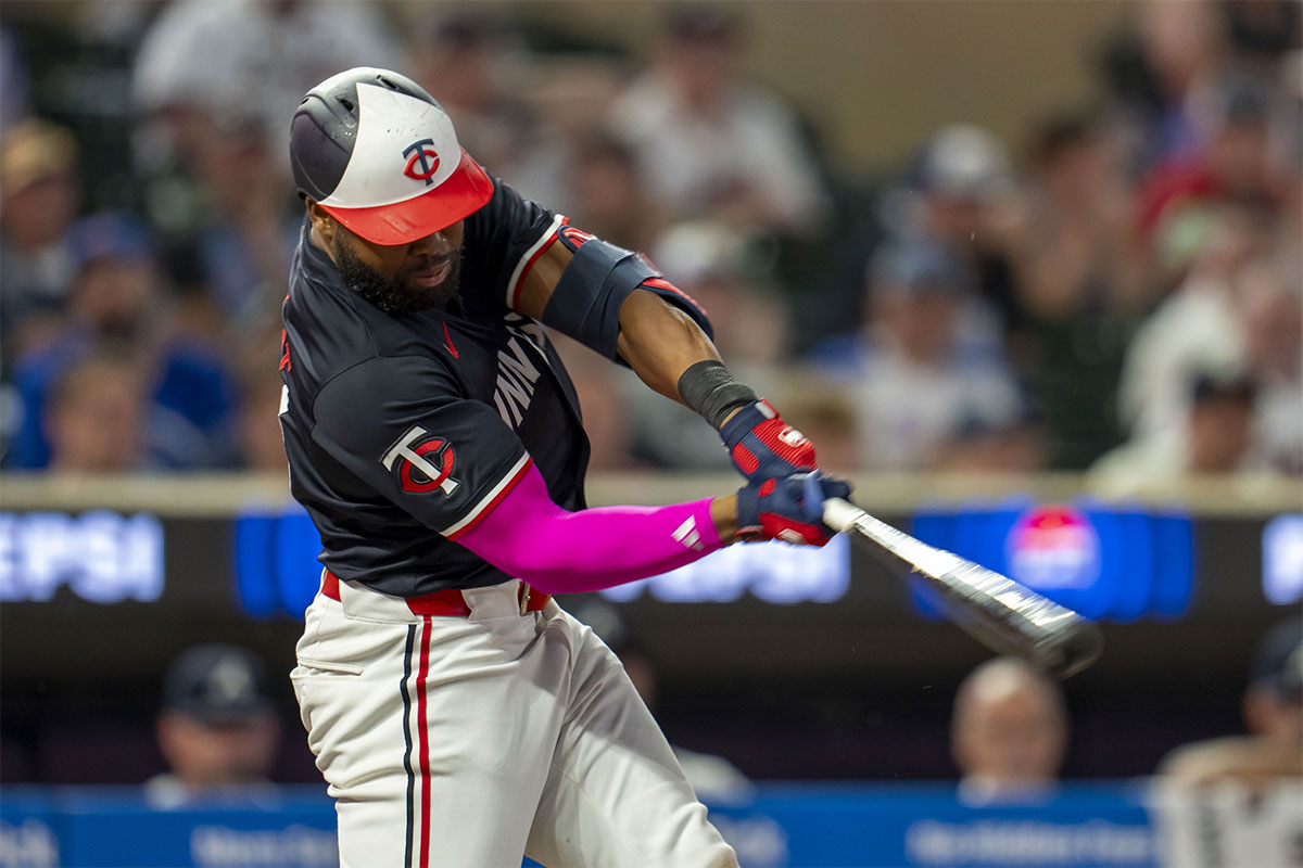 Minnesota Twins left fielder Manuel Margot (13) hits a RBI single against the Atlanta Braves in the fifth inning at Target Field.