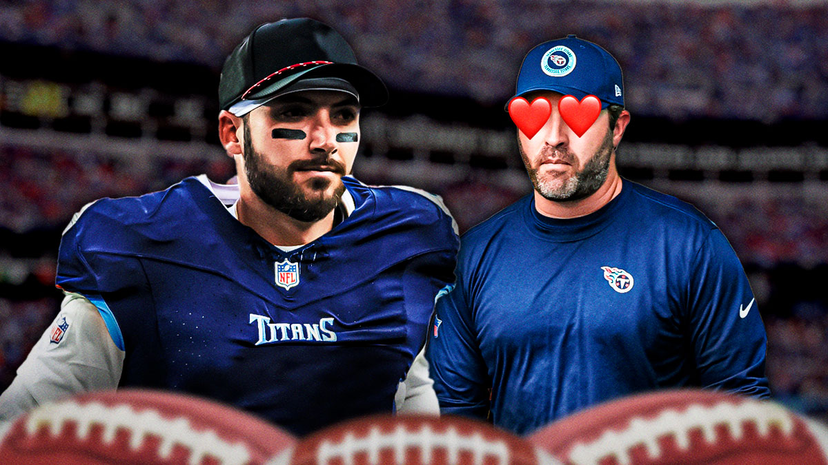 Tennessee Titans coach Brian Callahan with hearts in his eyes looking at Brandon Allen in a Titans uniform
