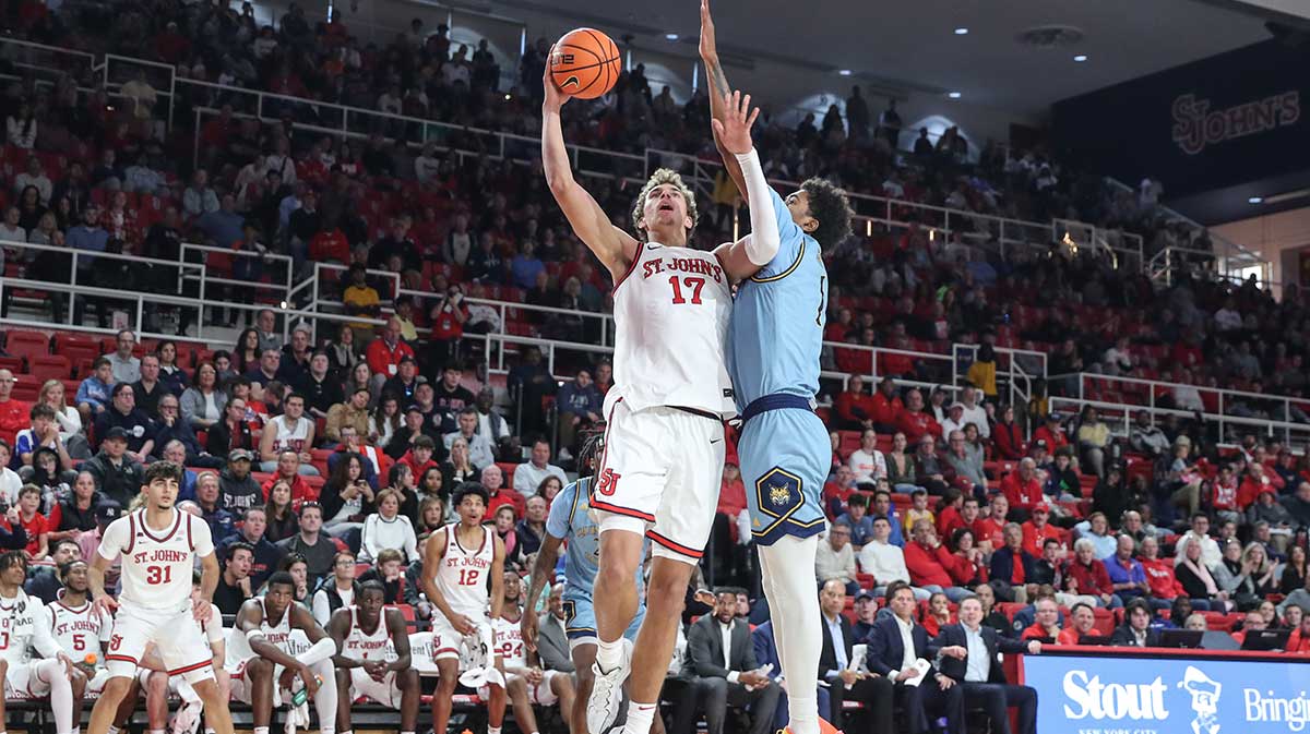 St. John's Red Storm forward Ruben Prey (17) drives past Quinnipiac Bobcats forward Richie Springs (1) in the second half at Carnesecca Arena.