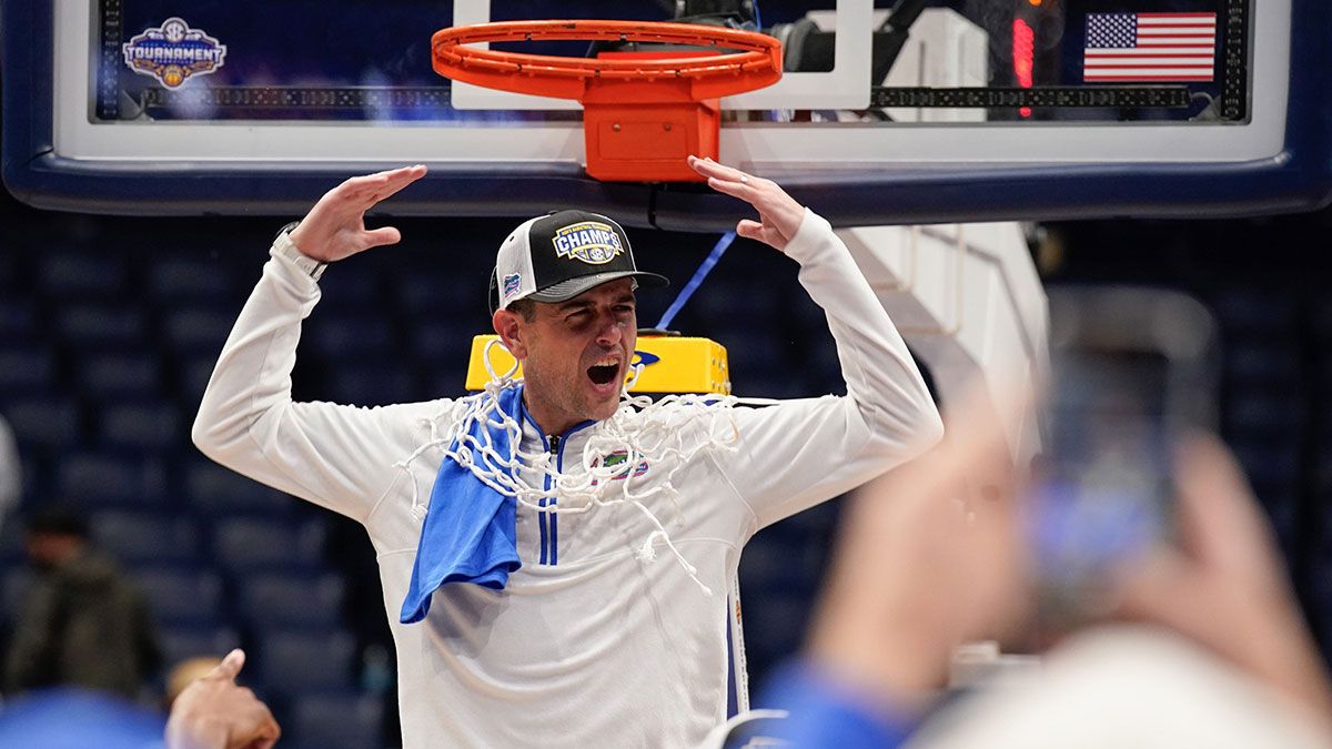 Florida head coach Todd Golden celebrates their win over Tennessee after the Southeastern Conference tournament championship at Bridgestone Arena