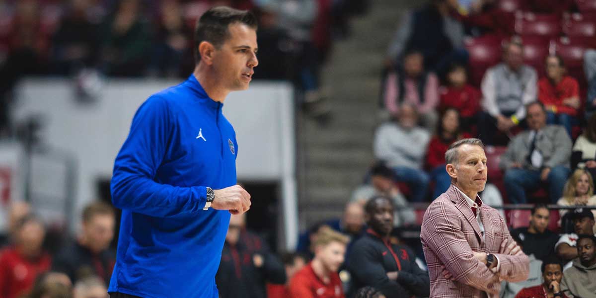 Florida Gators head coach Todd Golden and Alabama Crimson Tide head coach Nate Oats direct their teams during the second half at Coleman Coliseum.