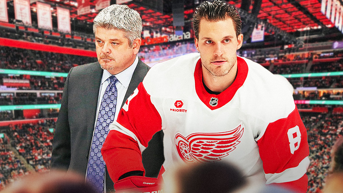 Red Wings coach Todd McLellan with Ben Chiarot at Little Caesars Arena.
