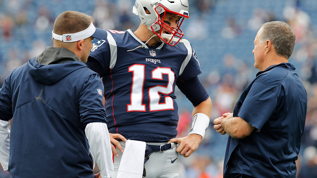 Patriots Tom Brady and Patriots Bill Belichick with ESPN Stephen A Smith behind them