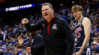 Arizona Wildcats head coach Tommy Lloyd during the second half against the Duke Blue Devils during an East Regional semifinal of the 2025 NCAA tournament at Prudential Center.