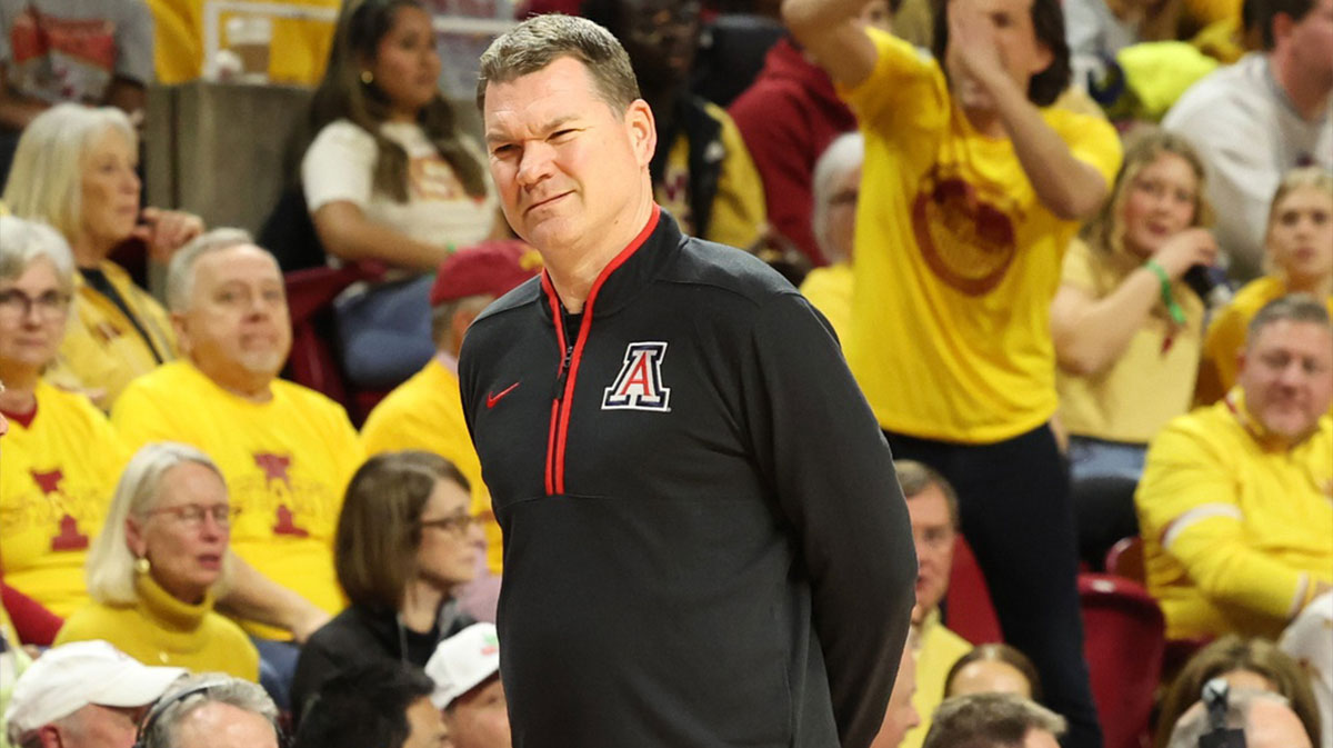 Mar 1, 2025; Ames, Iowa, USA; Arizona Wildcats head coach Tommy Lloyd watches his team play the Iowa State Cyclones during the first half at James H. Hilton Coliseum.