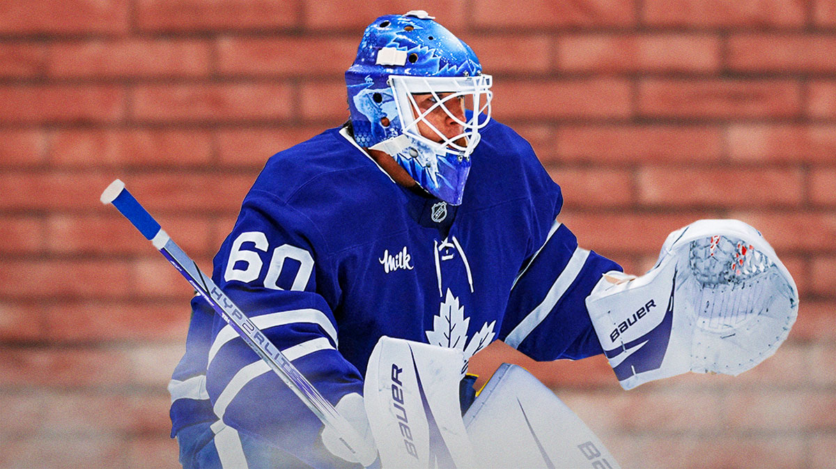 Joseph Woll next to a Brick Wall