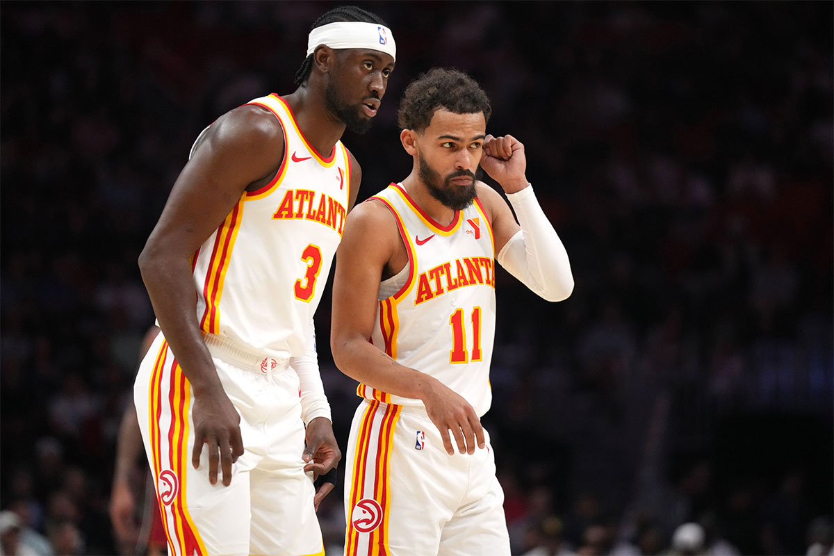 Atlanta Hawks Guard Trae Young (11) and Carris Levert (3) are discussing the strategy against Miami heat in the first half in the center of Kaseya. 