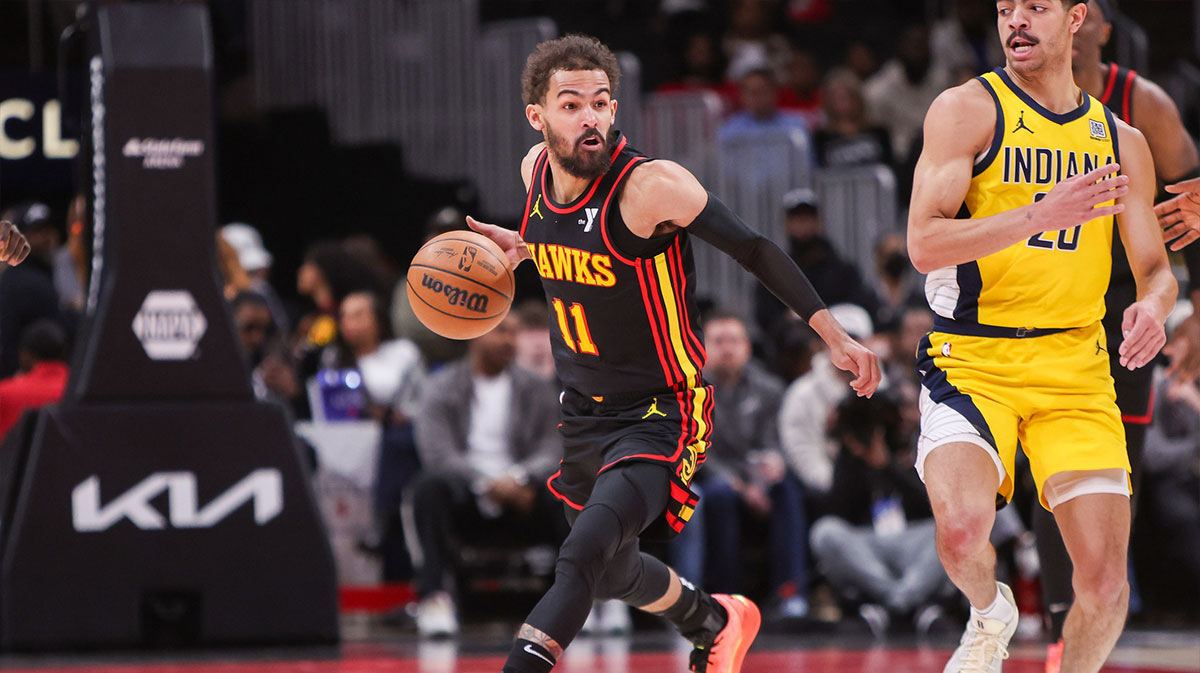 Atlanta Hawks Guard Trae Young (11) handles the ball against Indian Paca in the second quarter at the State Farm Arena. 