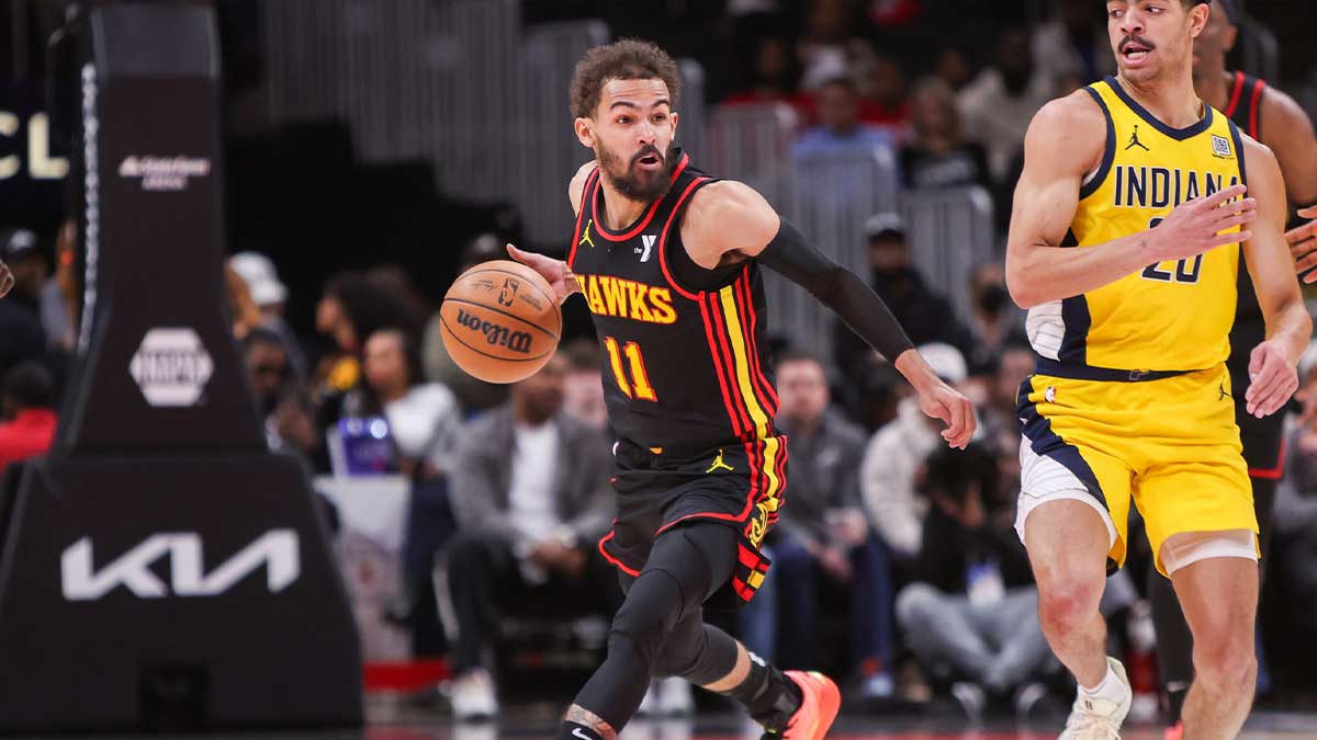 Atlanta Hawks Guard Trae Young (11) handles the ball against Indian Paca in the second quarter at the State Farm Arena. Mandatory Credit: Brett Davis-Imangn Pictures