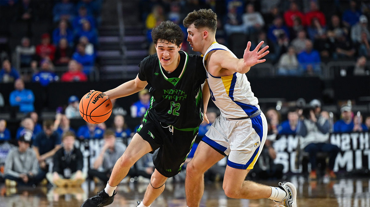 North Dakota Fighting Hawks guard Treysen Eaglestaff (52) brings the ball up court on Friday, March 7, 2025, at Denny Sanford Premier Center in Sioux Falls, S.D.