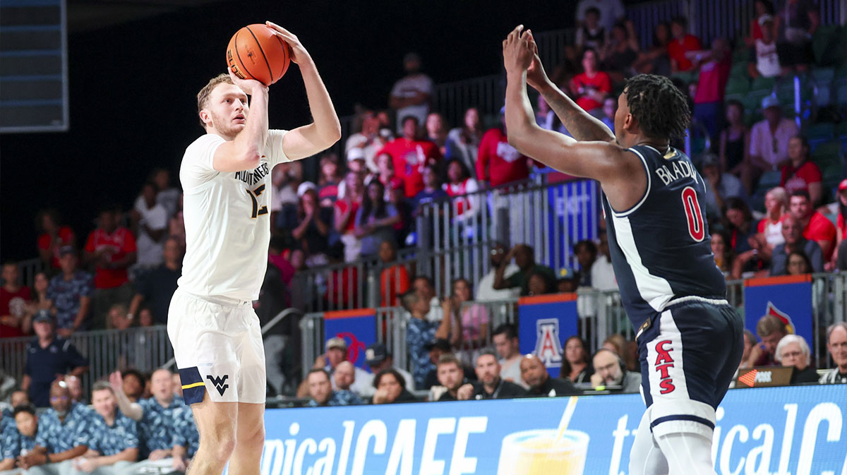 Western Virginia Mountaineering Guard Tucker Devries (12) Shooting over Arizona Wildcats Guard Jaden Bradley (0) During the second half in the Imperial Arena in Atlantis Resort.