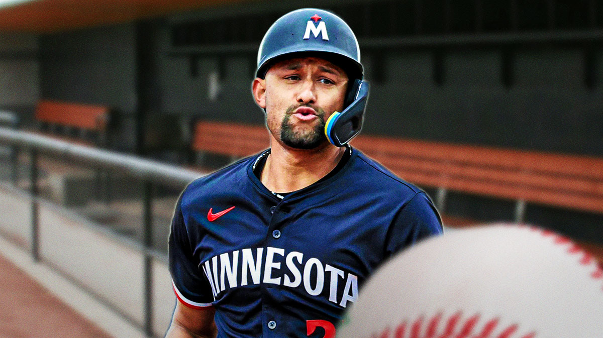 Twins Royce Lewis in the dugout looking serious.