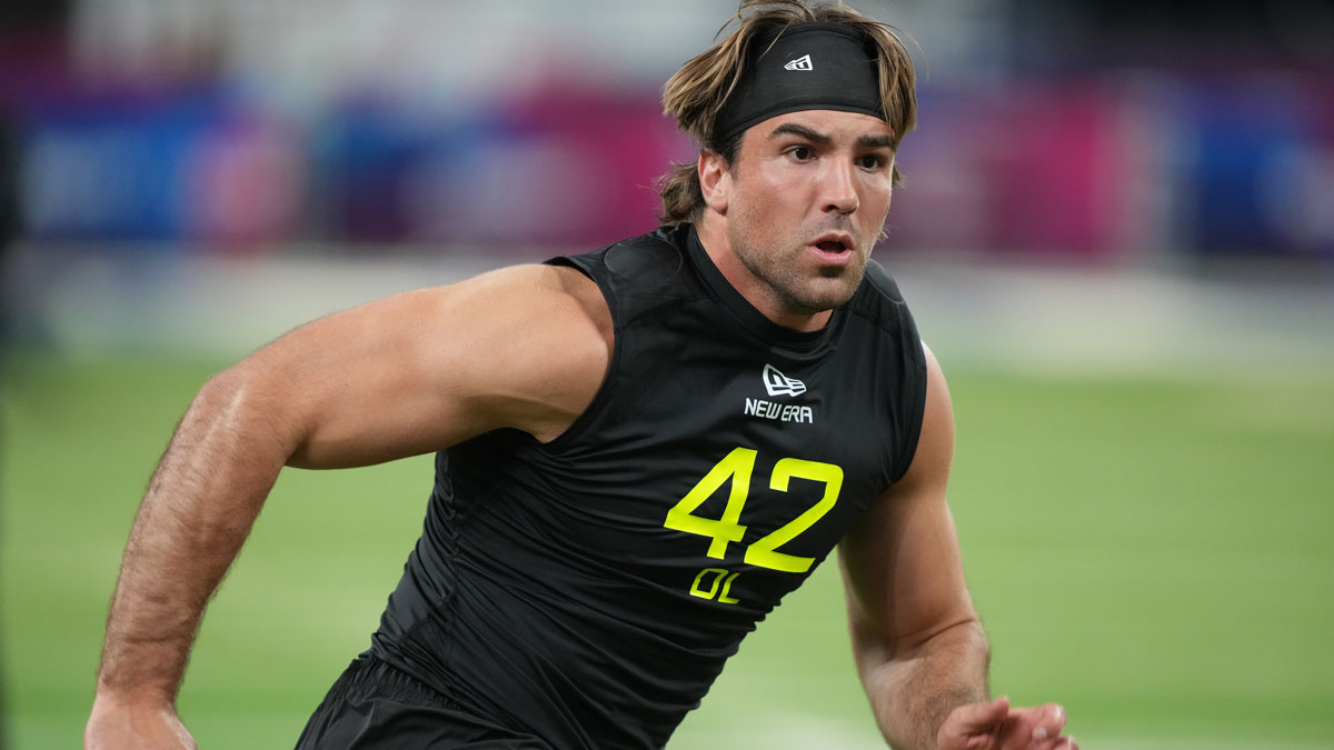 Feb 27, 2025; Indianapolis, IN, USA; Brigham Young defensive lineman Tyler Batty (DL42) participates in drills during the 2025 NFL Combine at Lucas Oil Stadium.