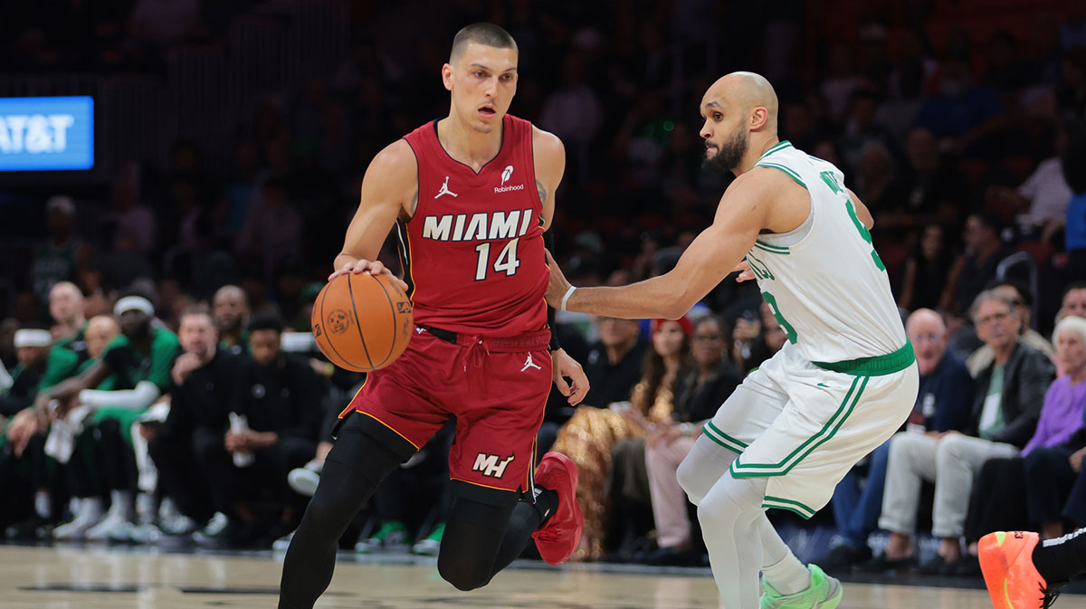 Miami Heror Guard Tyler Herro (14) Drive in the basket of last Boston Celtics Guard Derrick White (9) during the first quarter in the Cashier Center.