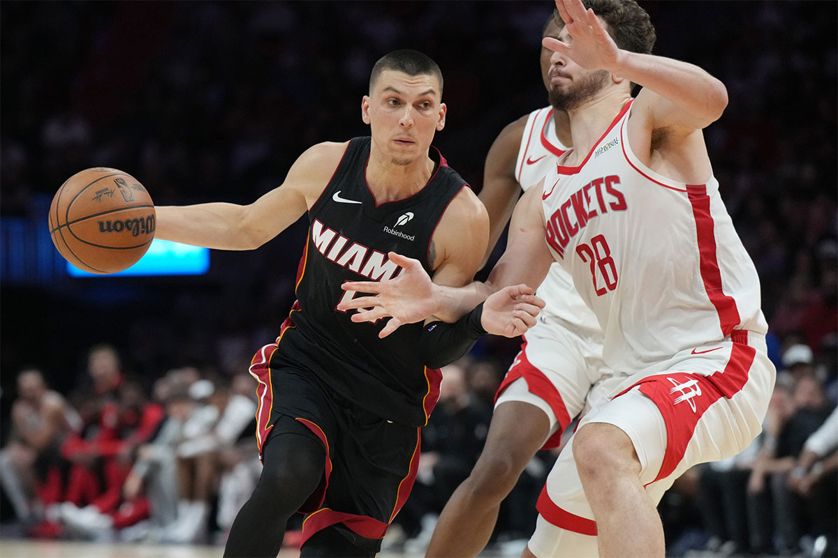 Miami Heat guard Tyler Herro (14) drives to the basket as Houston Rockets center Alperen Sengun (28) defends in the second half at Kaseya Center.
