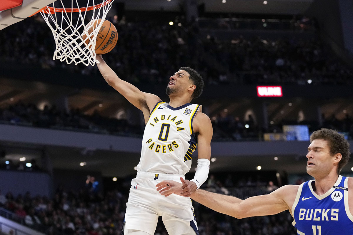 Indiana Pacers guard Tyrese Haliburton (0) drives for a dunk during the second quarter against the Milwaukee Bucks at Fiserv Forum.