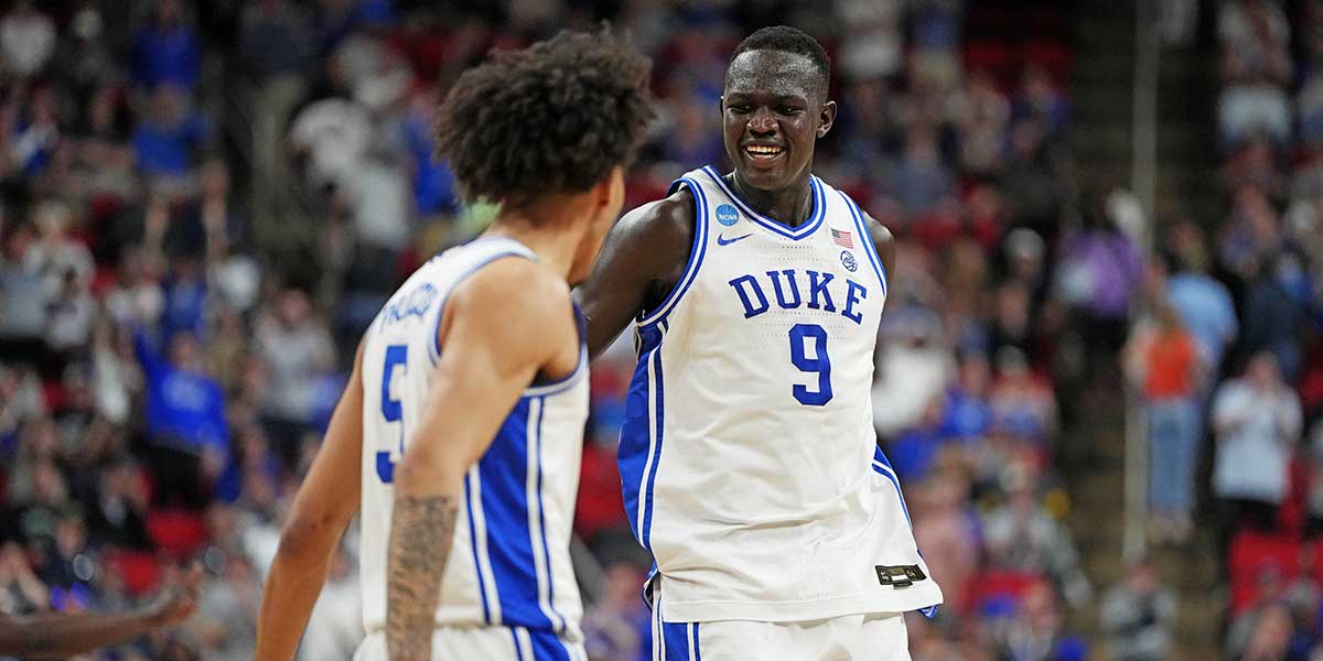 Mar 23, 2025; Raleigh, NC, USA; Duke Blue Devils guard Tyrese Proctor (5) and Duke Blue Devils center Khaman Maluach (9) reacts after a play against the Baylor Bears during the second half in the second round of the NCAA Tournament at Lenovo Center.