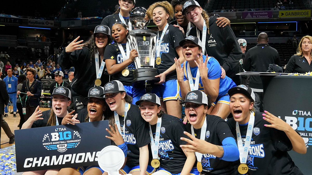 UCLA women's basketball players celebrate after defeating the USC Trojans during the 2025 TIAA Big Ten Women's Basketball Tournament final on Sunday, March 9, 2025, at Gainbridge Fieldhouse in Indianapolis. UCLA defeated USC 72-67.