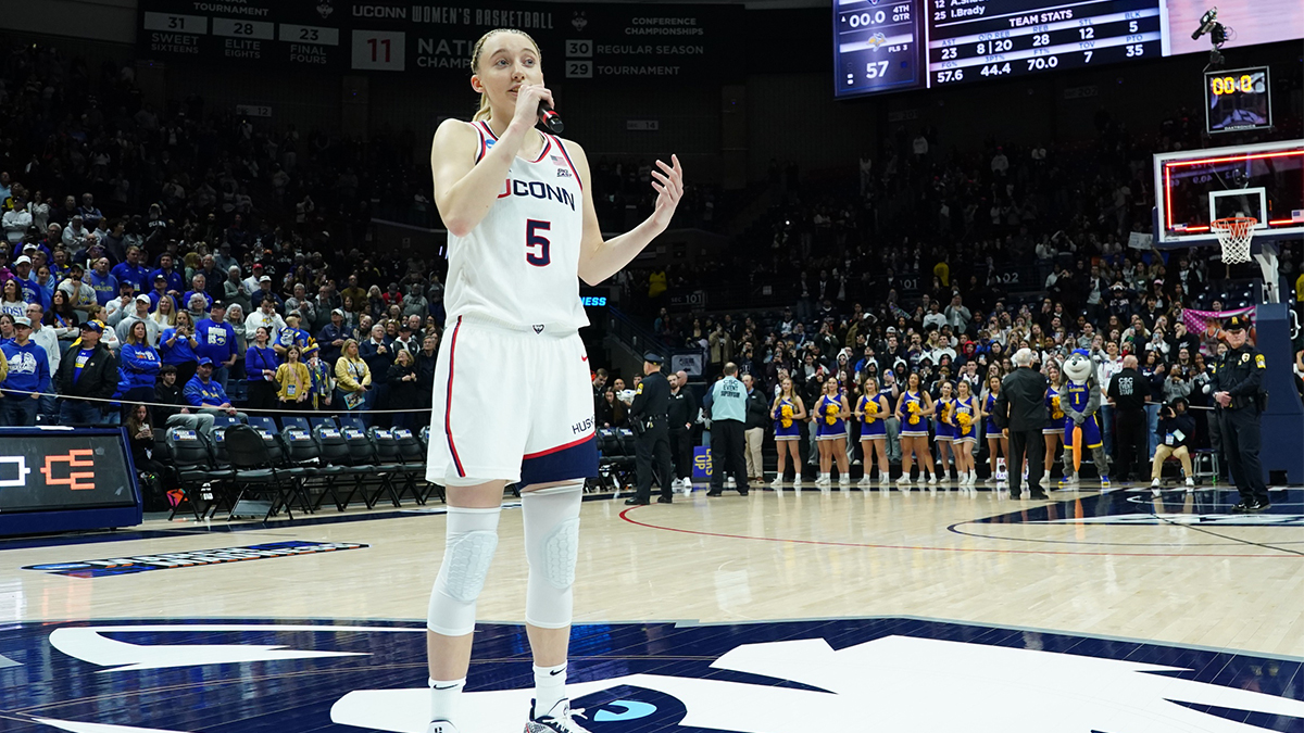 UConn Huskies guard Paige Bueckers (5) talks to the crowd after defeating the South Dakota State Jackrabbits at Harry A. Gampel Pavilion.